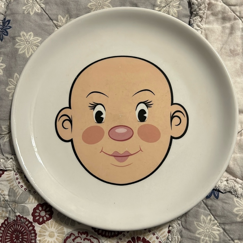 Fred Plays with his food plate